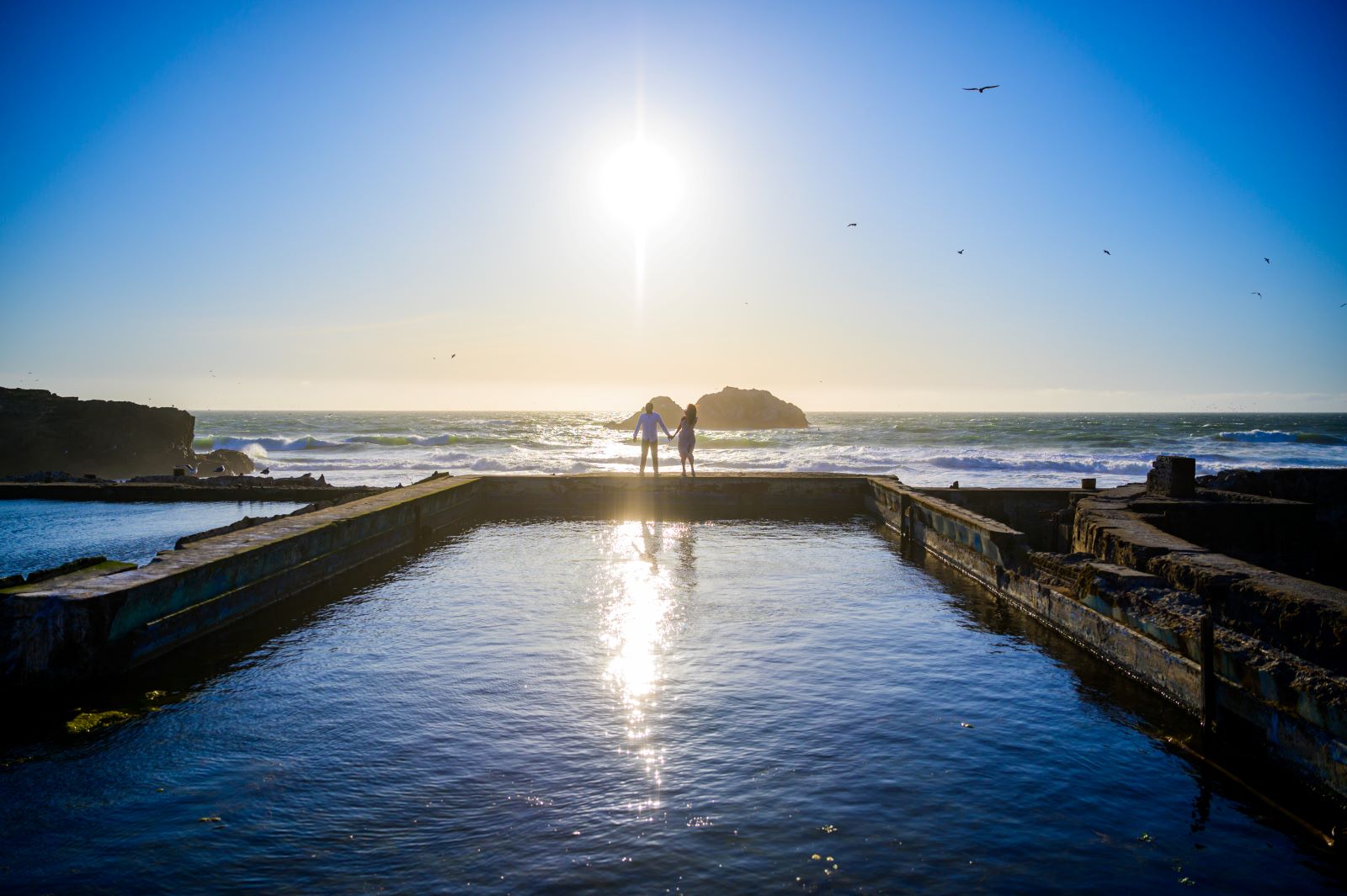 couple infront of setting sun